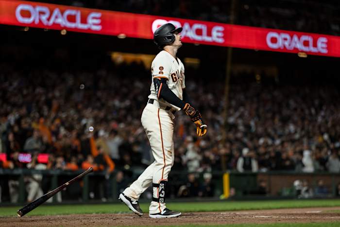 SF Giants right fielder Mike Yastrzemski watches his three-run home run against the San Diego Padres for a walk-off win during the tenth inning at Oracle Park on June 19, 2023.
